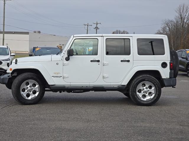 used 2014 Jeep Wrangler Unlimited car, priced at $16,487