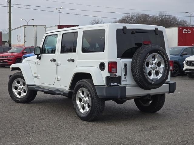 used 2014 Jeep Wrangler Unlimited car, priced at $16,487