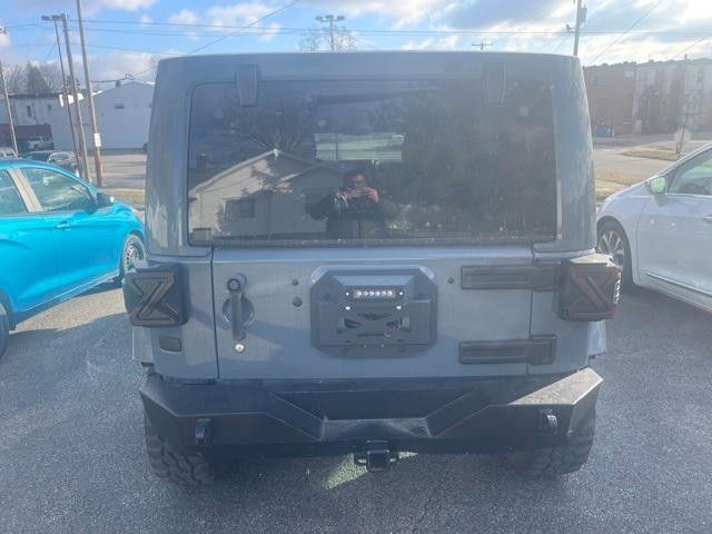 used 2014 Jeep Wrangler Unlimited car, priced at $18,370