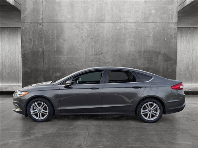 used 2018 Ford Fusion car, priced at $12,298