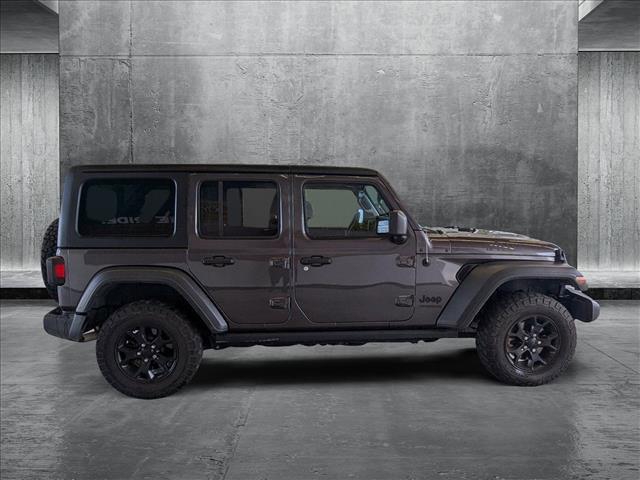 used 2021 Jeep Wrangler Unlimited car, priced at $27,198