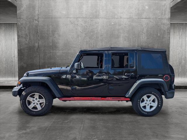 used 2016 Jeep Wrangler Unlimited car, priced at $16,998