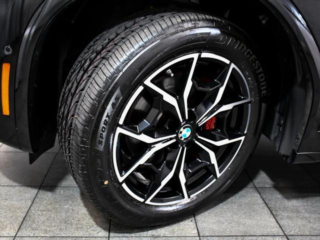 used 2023 BMW X4 car, priced at $53,888