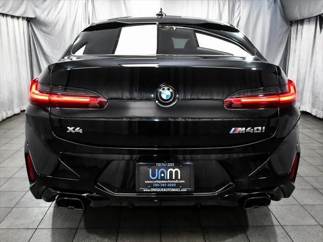 used 2023 BMW X4 car, priced at $53,888