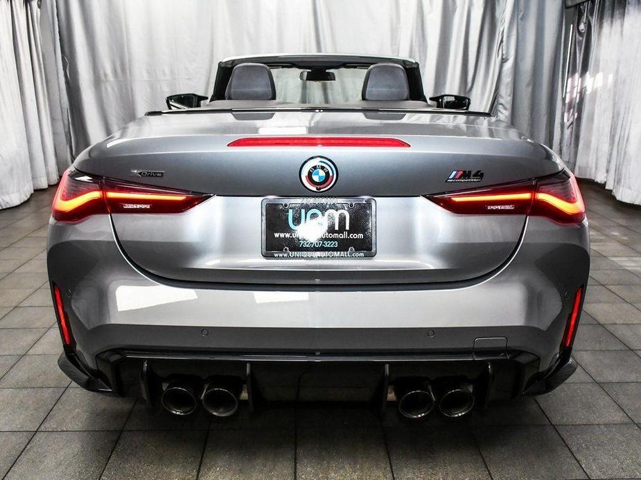 used 2023 BMW M4 car, priced at $68,777