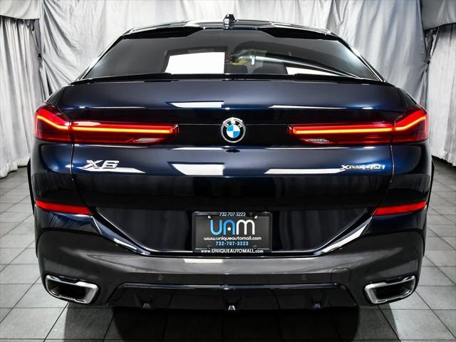 used 2024 BMW X6 car, priced at $55,777