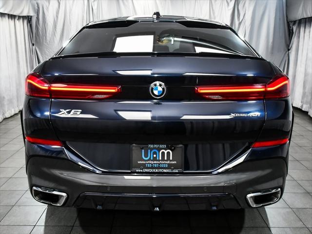 used 2024 BMW X6 car, priced at $54,888