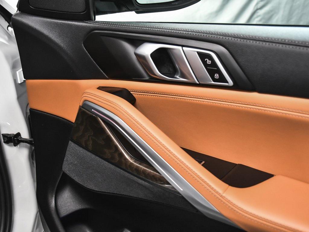 used 2023 BMW X6 car, priced at $48,444