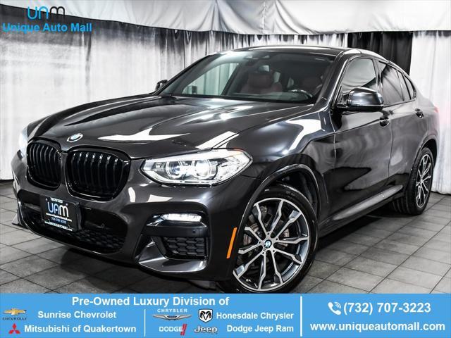 used 2021 BMW X4 car, priced at $33,555