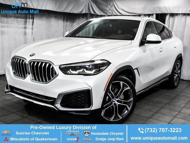 used 2022 BMW X6 car, priced at $48,444