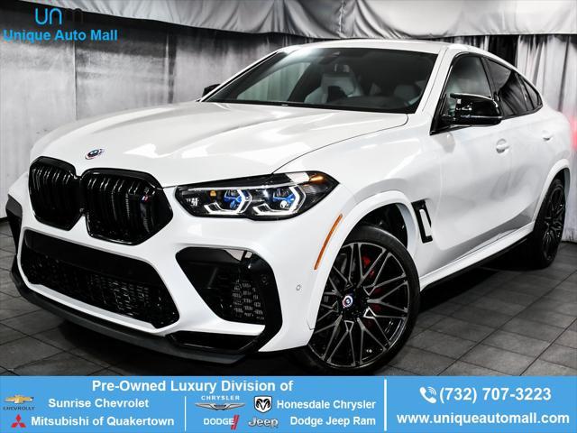 used 2022 BMW X6 M car, priced at $83,777