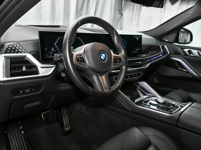 used 2025 BMW X6 car, priced at $67,888