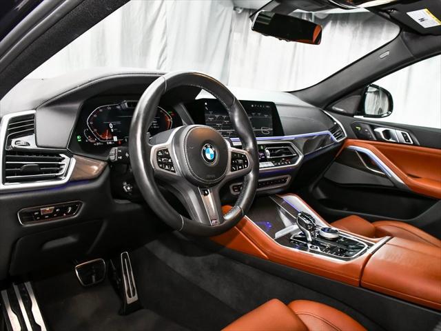 used 2023 BMW X6 car, priced at $53,888