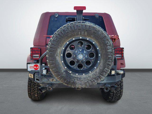 used 2014 Jeep Wrangler Unlimited car, priced at $17,490