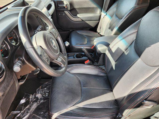 used 2014 Jeep Wrangler Unlimited car, priced at $17,277