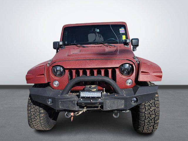 used 2014 Jeep Wrangler Unlimited car, priced at $17,277