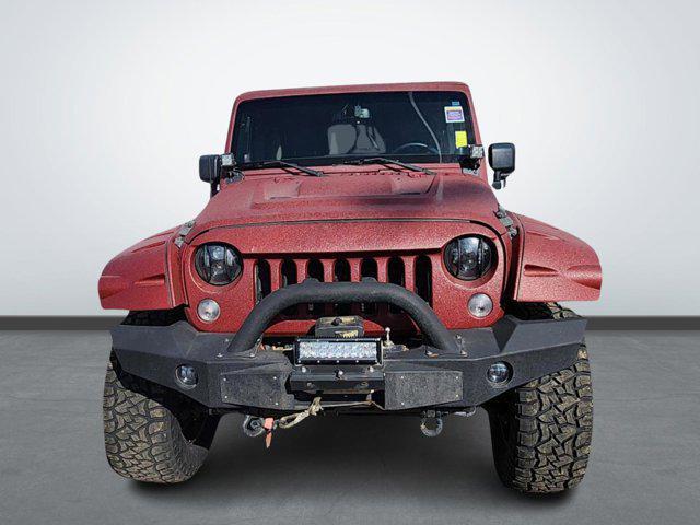 used 2014 Jeep Wrangler Unlimited car, priced at $17,490
