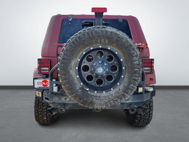 used 2014 Jeep Wrangler Unlimited car, priced at $17,277
