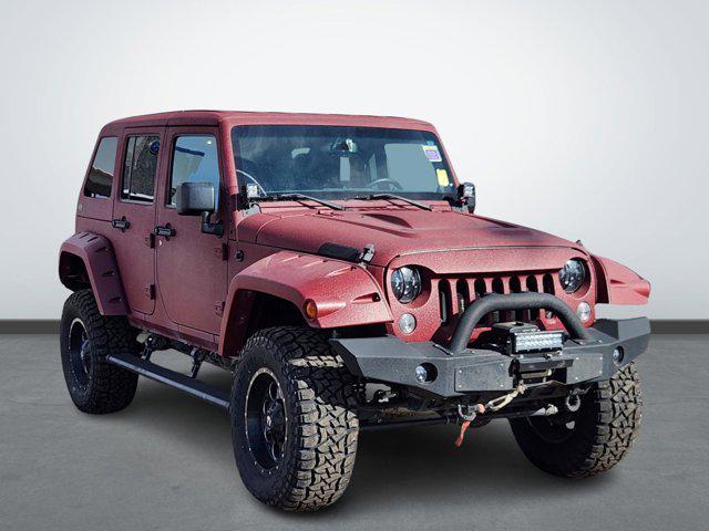 used 2014 Jeep Wrangler Unlimited car, priced at $17,277