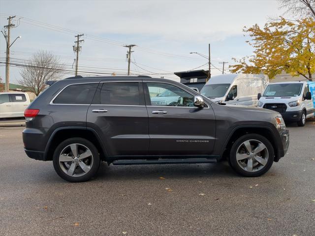 used 2014 Jeep Grand Cherokee car, priced at $13,669