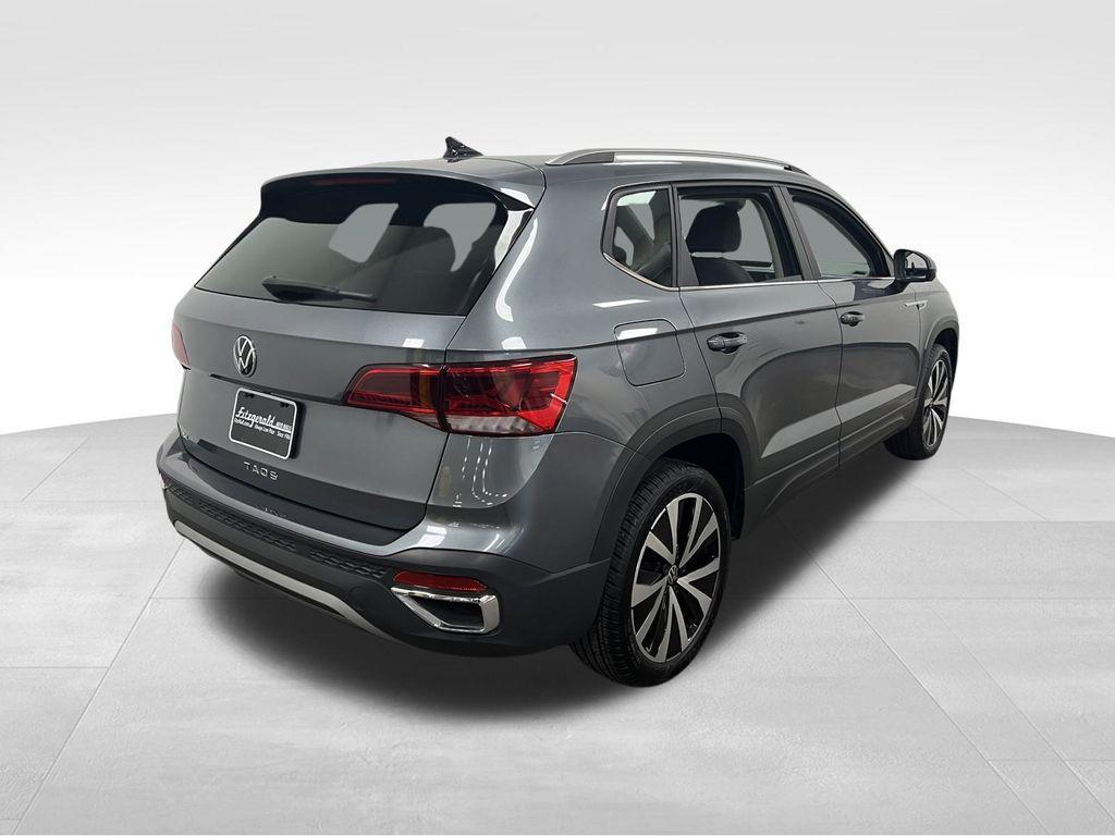 used 2024 Volkswagen Taos car, priced at $22,495