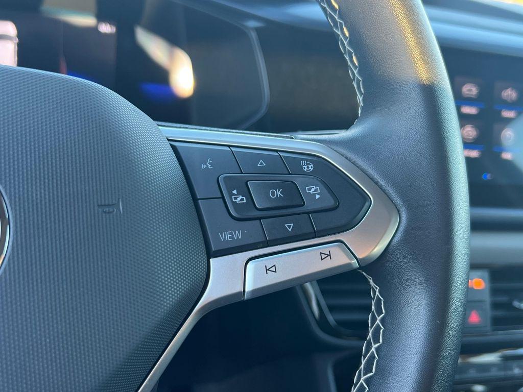 used 2023 Volkswagen Taos car, priced at $18,395