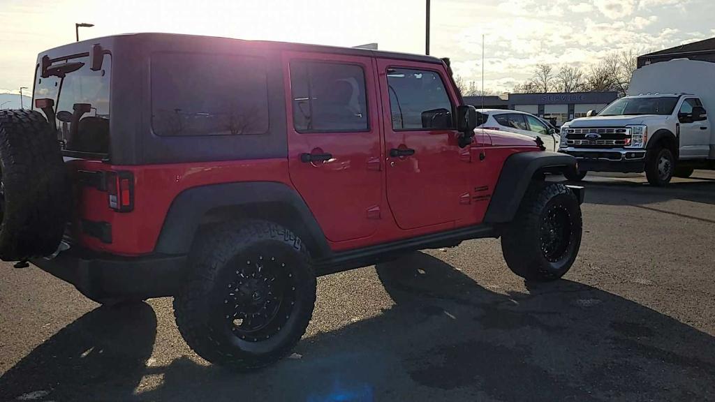 used 2015 Jeep Wrangler Unlimited car, priced at $20,998