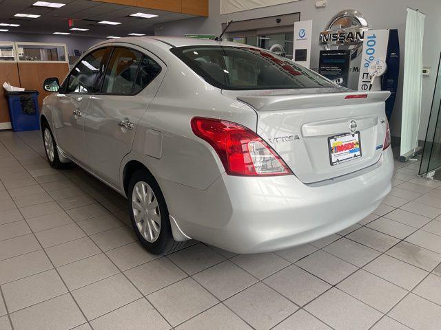 used 2014 Nissan Versa car, priced at $9,000