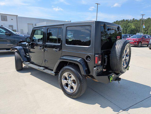 used 2015 Jeep Wrangler Unlimited car, priced at $14,990