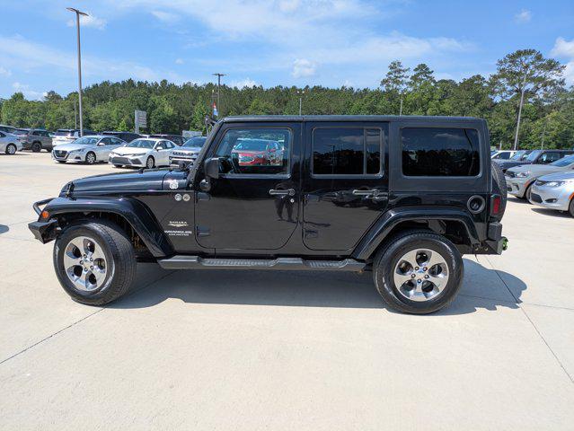 used 2015 Jeep Wrangler Unlimited car, priced at $14,990