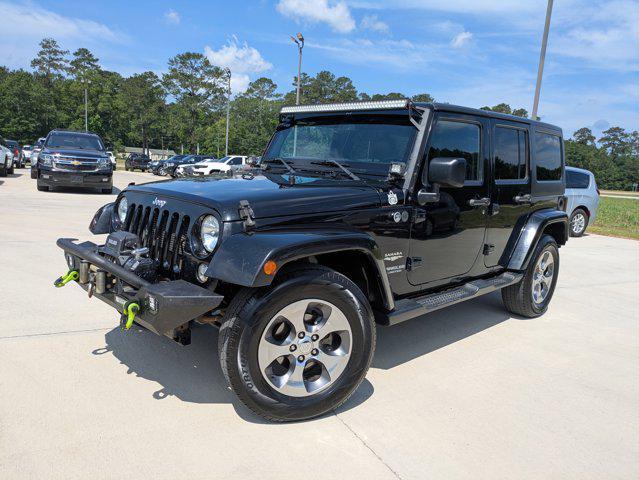 used 2015 Jeep Wrangler Unlimited car, priced at $14,990