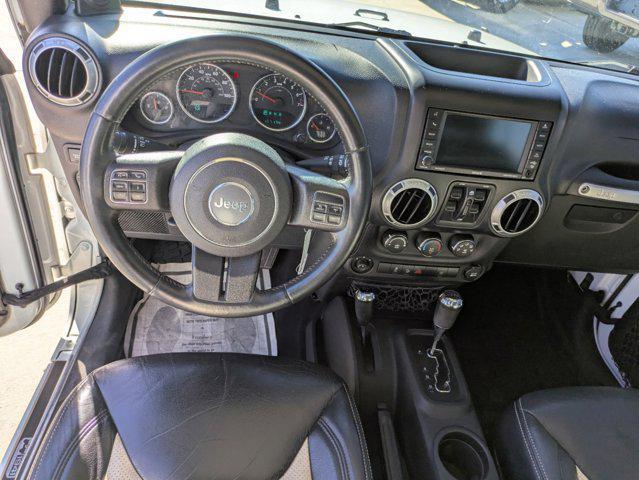 used 2014 Jeep Wrangler Unlimited car, priced at $13,990