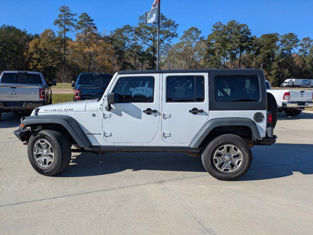 used 2014 Jeep Wrangler Unlimited car, priced at $13,990