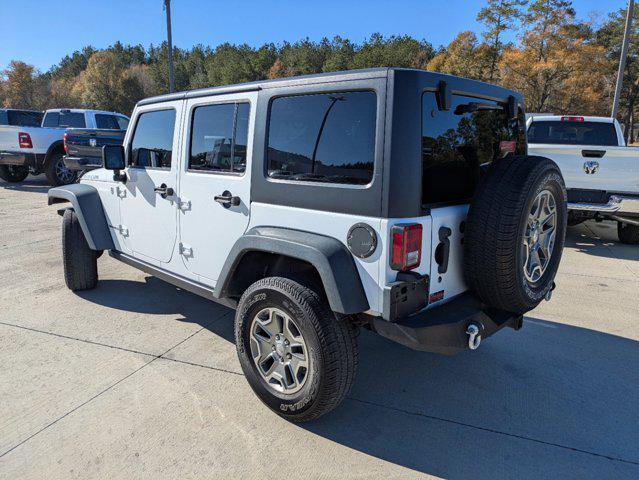 used 2014 Jeep Wrangler Unlimited car, priced at $13,990