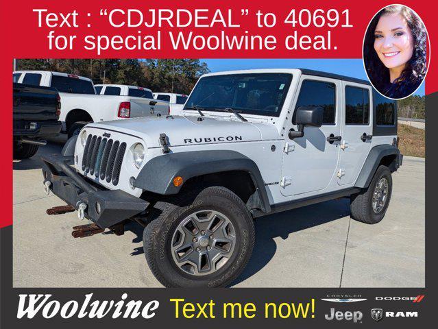 used 2014 Jeep Wrangler Unlimited car, priced at $13,990