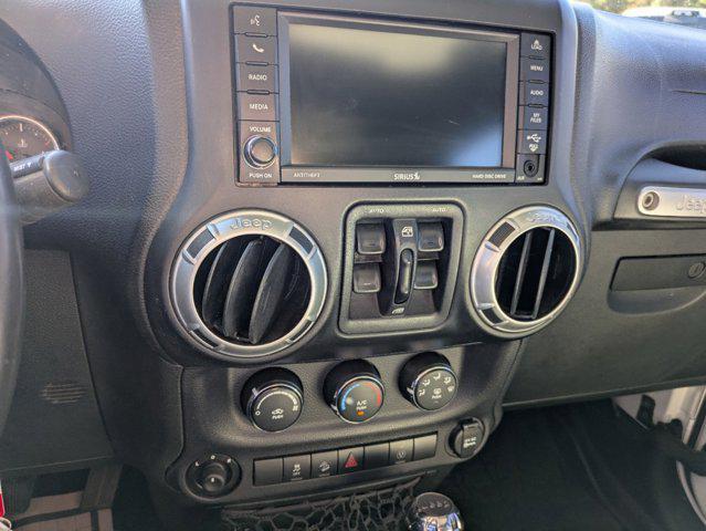 used 2014 Jeep Wrangler Unlimited car, priced at $13,990