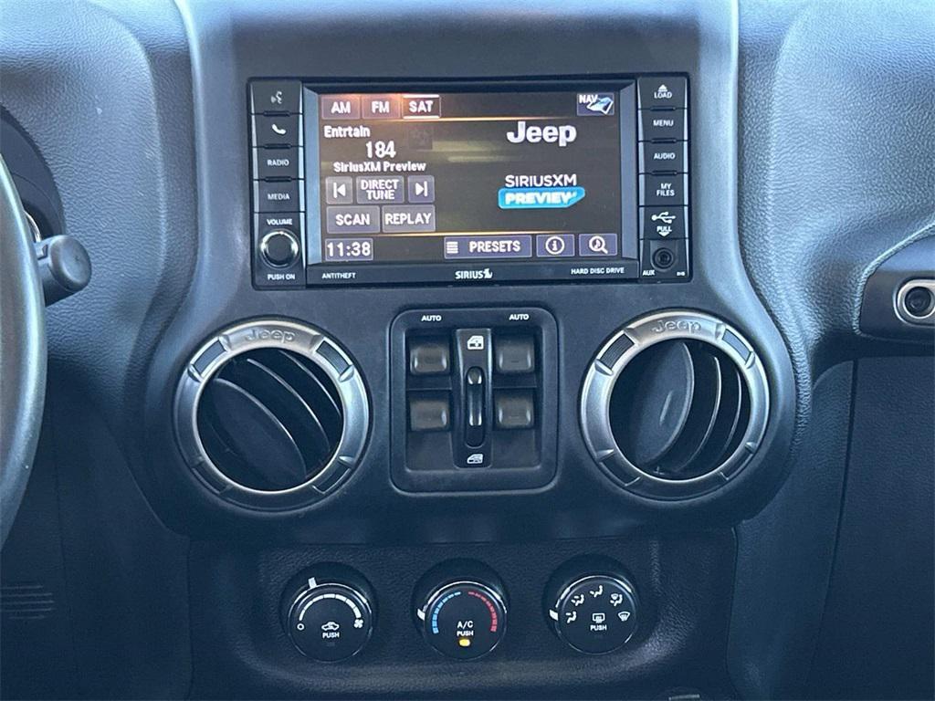 used 2018 Jeep Wrangler JK Unlimited car, priced at $24,991