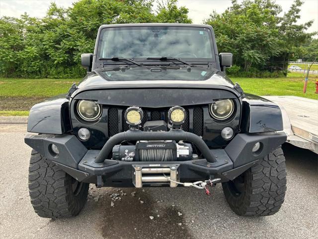 used 2015 Jeep Wrangler Unlimited car, priced at $21,981