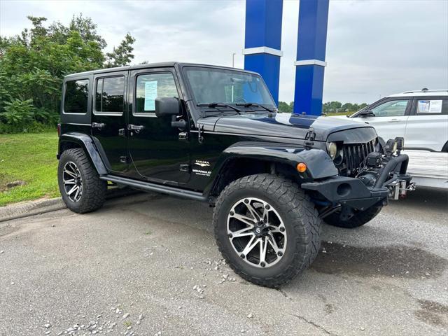 used 2015 Jeep Wrangler Unlimited car, priced at $21,981