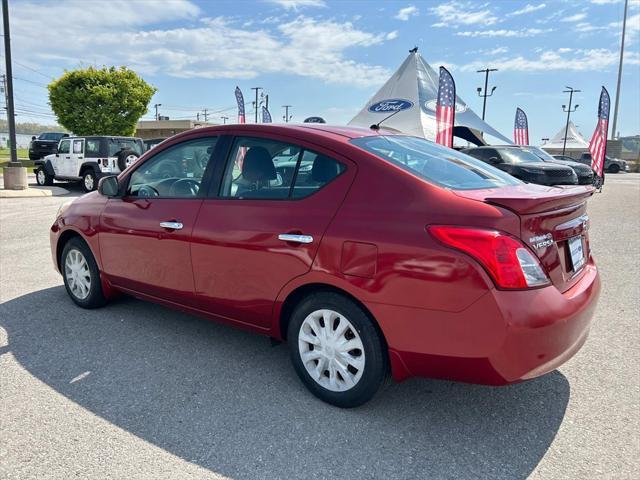 used 2014 Nissan Versa car, priced at $10,990
