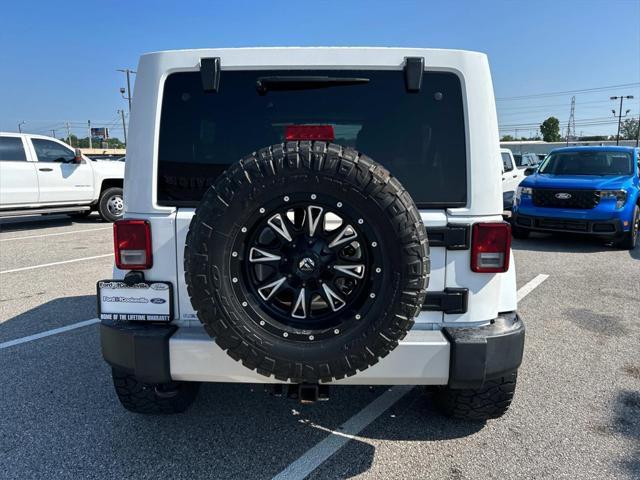 used 2014 Jeep Wrangler Unlimited car, priced at $19,981