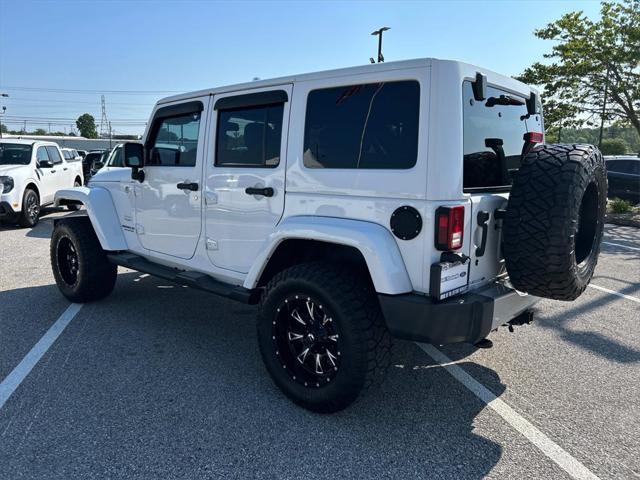 used 2014 Jeep Wrangler Unlimited car, priced at $19,981