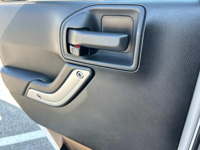 used 2014 Jeep Wrangler Unlimited car, priced at $19,981