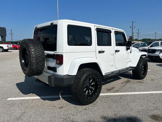 used 2014 Jeep Wrangler Unlimited car, priced at $19,981