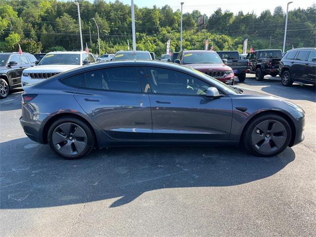 used 2023 Tesla Model 3 car, priced at $27,479