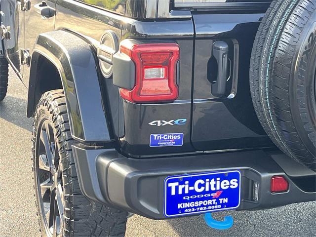 used 2024 Jeep Wrangler 4xe car, priced at $33,759