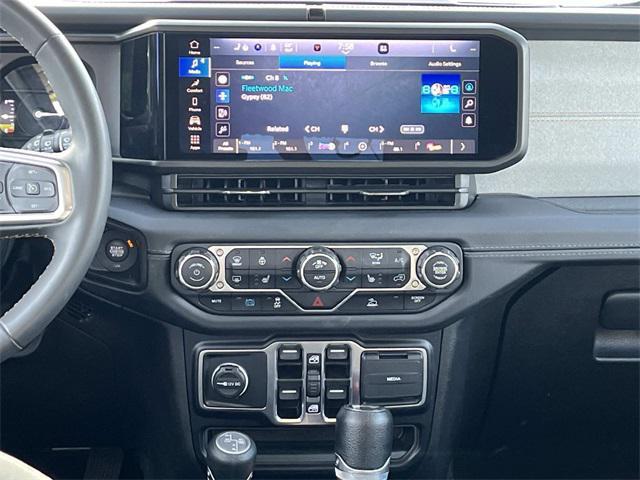 used 2024 Jeep Wrangler 4xe car, priced at $33,759