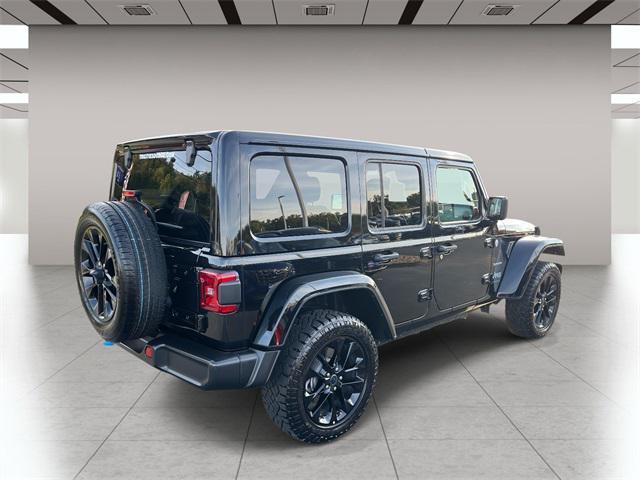 used 2024 Jeep Wrangler 4xe car, priced at $33,759