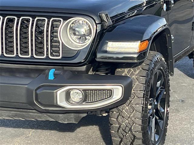 used 2024 Jeep Wrangler 4xe car, priced at $33,759
