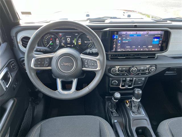 used 2024 Jeep Wrangler 4xe car, priced at $33,759